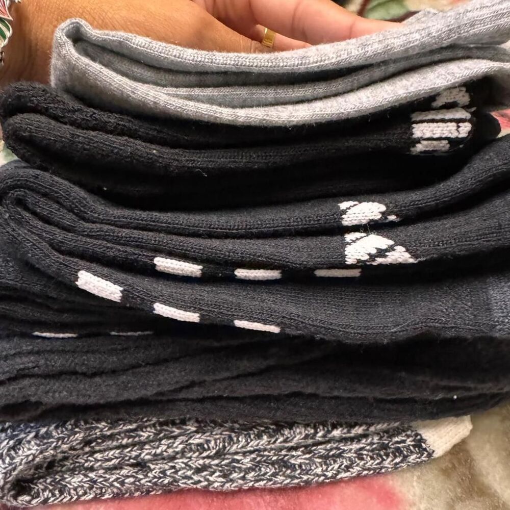 bundle of socks in black, gray, and white